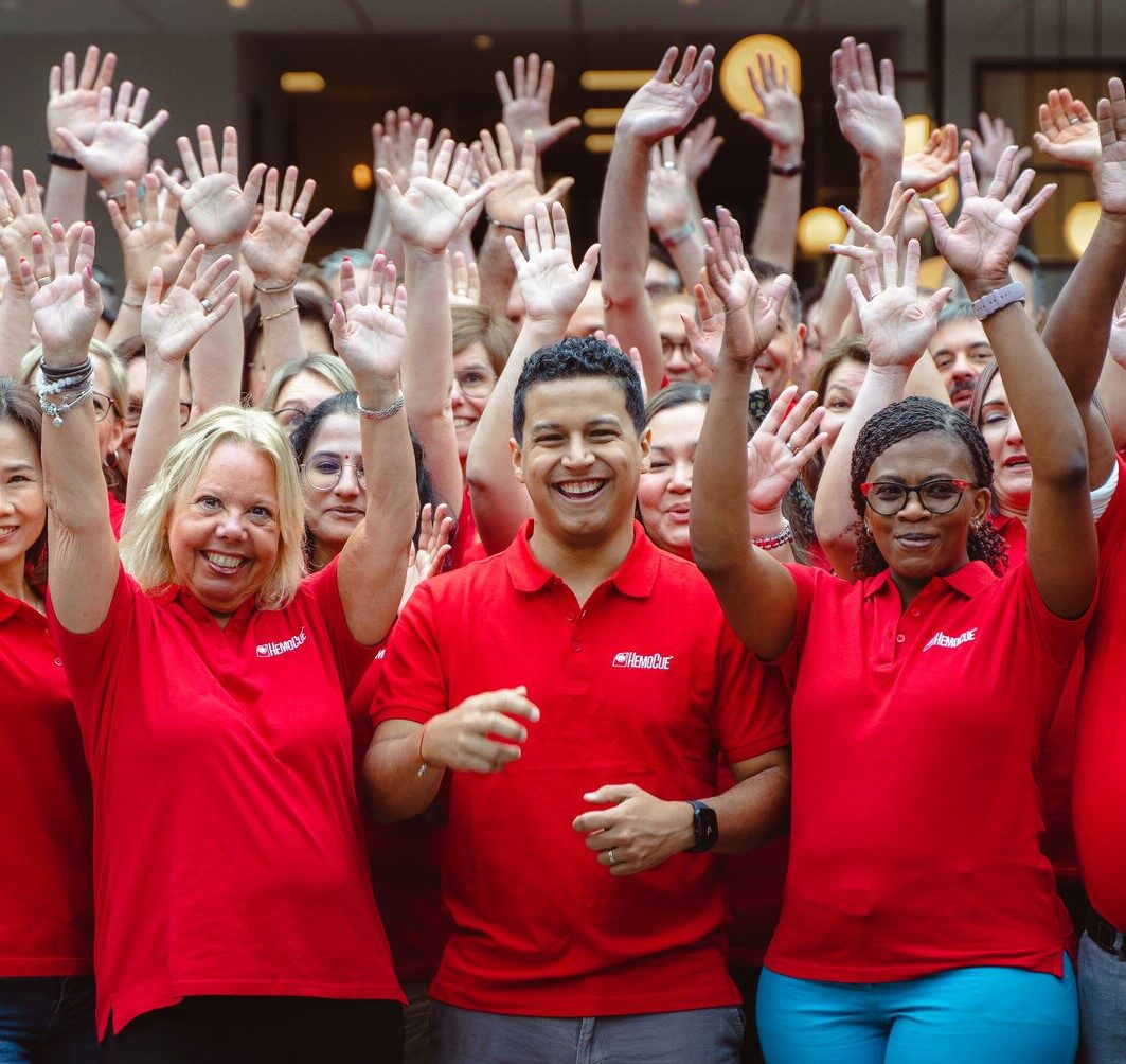 Happy HemoCue employees with diverse ethnic backgrounds