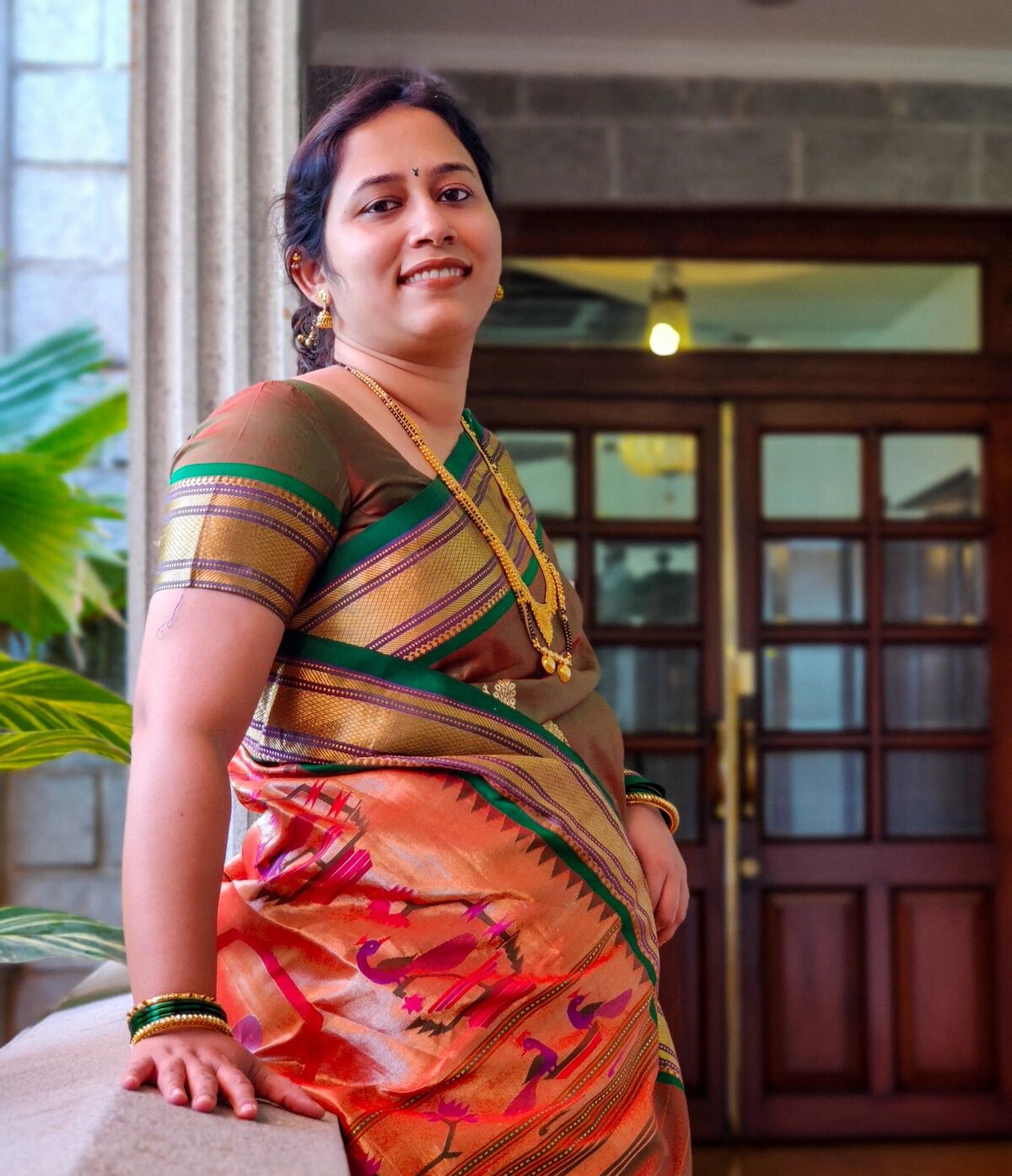 Female HemoCue employee smiling in Indian clothes